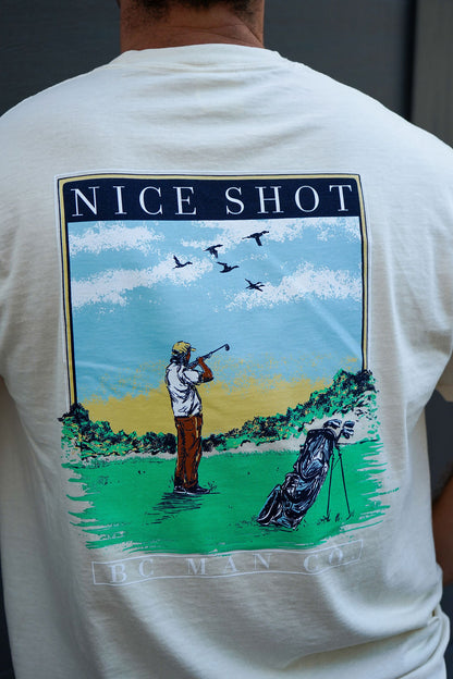Back view of the BC Man Co Nice Shot Tee in ivory showing golfer shooting at ducks over the fairway